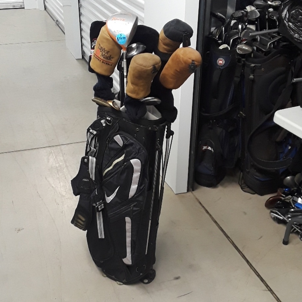 Used golf clubs with caddy carry bag Nike bag.